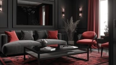 Luksusowy salon w eleganckim, nowoczesnym stylu z ciemnymi ścianami, czerwonymi akcentami i designerskim oświetleniem. Idealne wnętrze dla nowoczesnej optymalnej aranżacji.