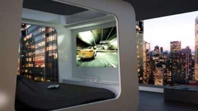 Nowa, nowoczesna sypialnia z panoramicznymi oknami i widokiem na centrum miasta, idealne miejsce do relaksu i odpoczynku.