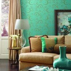 Stylowe wnętrze salonu z kolorowymi poduszkami i dekoracjami, elegancki wystrój domu, inspiracje aranżacji wnętrz, elementy dekoracyjne, komfortowe miejsce do relaksu, harmonia kolorów, wysokiej jakości meble, elegancka atmosfera.