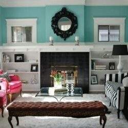 Komfortowy i elegancki salon z nowoczesnym wystrojem, kolorami i dodatkami, idealne miejsce do relaksu i spędzania czasu z rodziną, zdjęcie wnętrza domu.