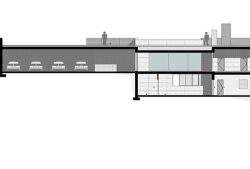Nowo wybudowany budynek szkoły z nowoczesną architekturą i energooszczędnymi rozwiązaniami, odpowiedni dla edukacji dzieci i młodzieży.