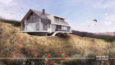 Nowa nowoczesna budowla na wzgórzu w naturalnym otoczeniu z roślinnością i niebem w tle, idealna do poprawy estetyki i funkcjonalności przestrzeni mieszkań i biur.