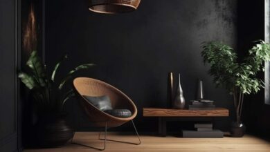 Nowoczesny elegancki salon z zielonymi roślinami i minimalistycznym wystrojem, idealny do relaksu i pracy w domu.