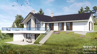 Elegancki nowoczesny dom z dużym balkonem i panoramicznymi oknami w spokojnej okolicy z zielonym otoczeniem i przestronnym ogrodem, idealny dla rodzin szukających komfortu i funkcjonalności.