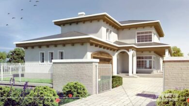 Przytulny dom jednorodzinny z nowoczesną architekturą, otoczony zielenią i ogrodzeniem, idealny do zamieszkania w Polsce.