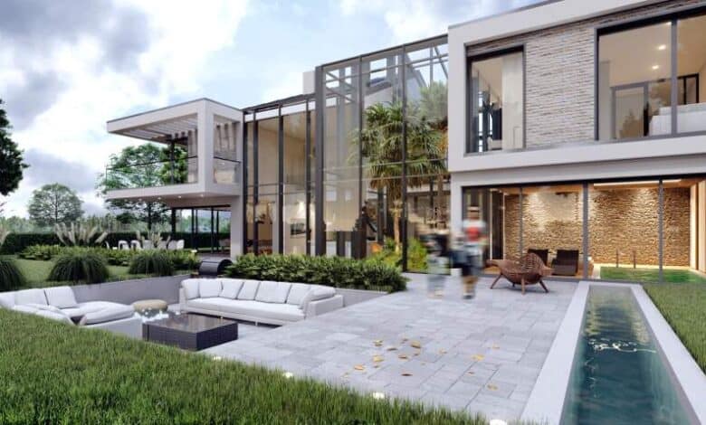 Nowoczesny dom z dużymi oknami i zielonym ogrodem, idealny dla rodzin szukających komfortu i funkcjonalności. Elegancka architektura i przestronne wnętrza zapewniają luksusowe warunki życia.