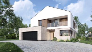 Nowoczesny dom jednorodzinny z elegancką architekturą i dużymi oknami, doskonały dla rodzin poszukujących komfortu i funkcjonalności na optymalnym poziomie.