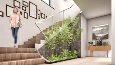 Zielona roślinność w nowoczesnym wnętrzu, naturalne elementy w domowym domu, stylowa przestrzeń z roślinami, aranżacja wnętrza z roślinami, ekologia i design w jednym miejscu.